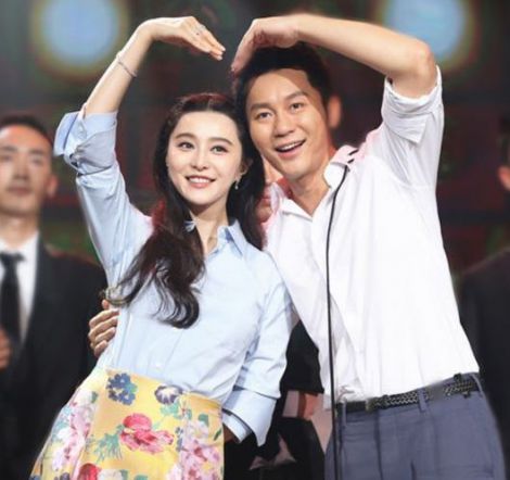 Li Chen with his fiancee Fan Bingbing.