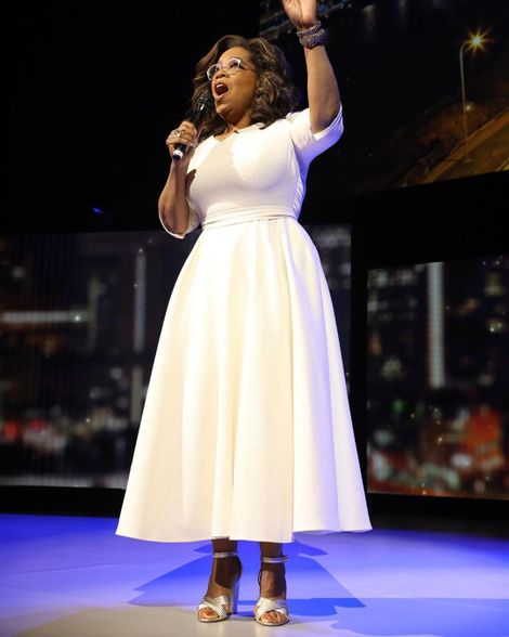 Oprah Winfrey's height is 1.69 m tall