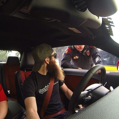 Aaron Kaufman driving his car