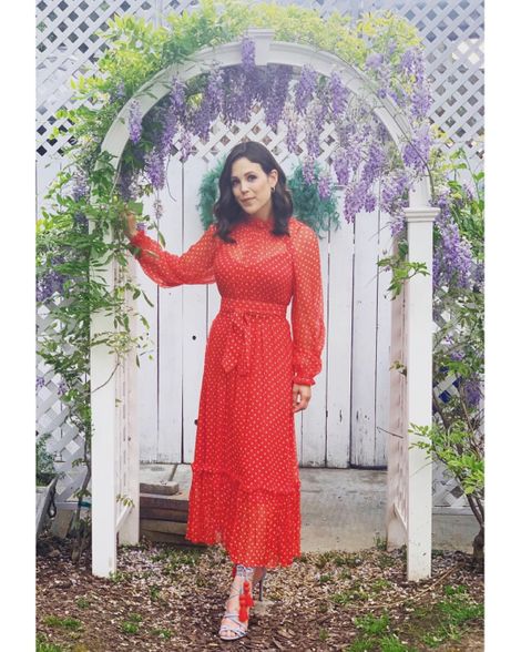 Erin Krakow in a red floral dress