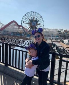 Sadie Sink with her sister in DisneyLand