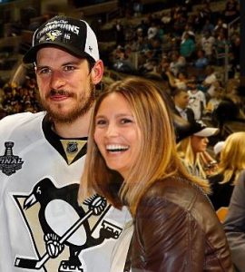 Kathy with her partner in the Hockey stadium