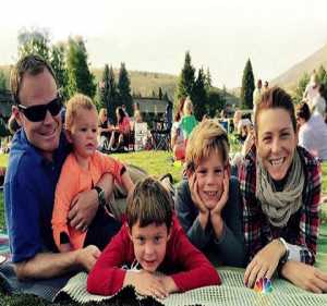 Andy and his wife, Stephanie Ruhle along with their children