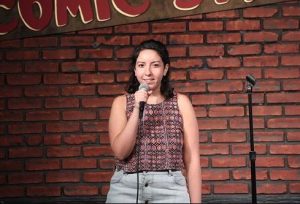 Dina Hashem on the stage of The Comic Strip