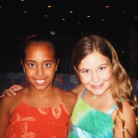 Simone Alexandra Johnson with her friend in her childhood days