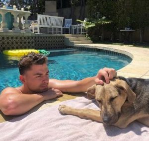 Cameron enjoying his quality time with his dog