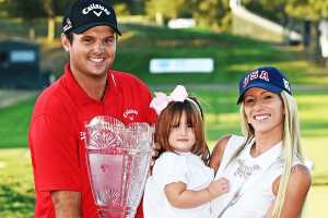 Justine Karain and Patrick Reed with their first child, Windsor-Wells.