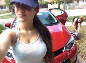 Picture of Angie washing her car