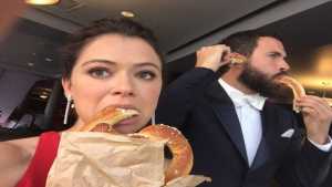 Tatiana Maslany And Tom Cullen eating sweat bread