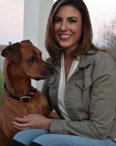 Emily with her dog