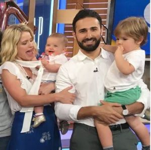 Max Shifrin and Sara Haines holding their two children