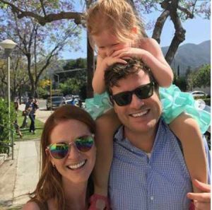 Peter Lanfer with his wife, Sarah Drew and their daughter