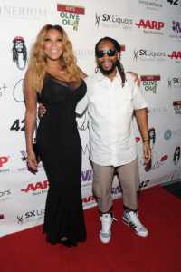 Nicole Smith and Lil Jon in an award ceremony