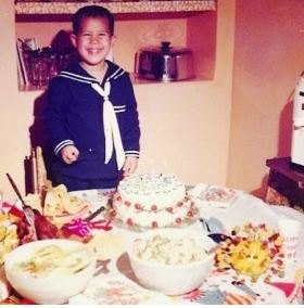 Vladimir Duthiers celebrating his birthday during his childhood