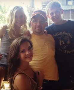 Randy Hyland with his three children, Brooke, Josh and Paige Hyland