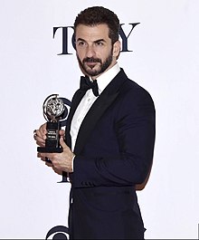 Michael Aronov winning a Tony Award for his performance in Oslo.