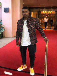 Image: Marc John Jefferies in a red Carpet