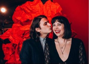 Alex Boniello kissing his girlfriend, April Lavalle.