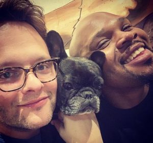 Michael James Scott with his fiance, Jeremy Merrifield, and his pet pit bull.