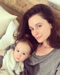 Melanie Papalia with her child.