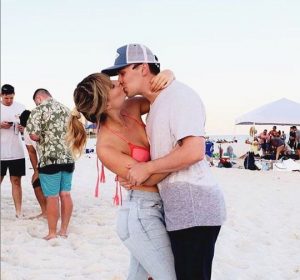 Christian Robinson in Flora Bama Mullet Toss with her boyfriend.