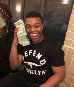 Image: Marc John Jefferies flaunting his currency