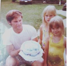 Childhood photo of Jennifer Gareis with her father and sister.