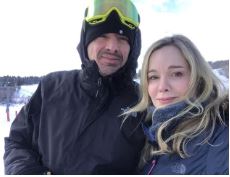 Jennifer Gareis and her husband skiing together.