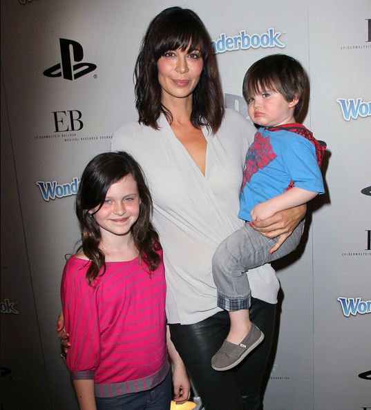 Gemma Beason arrived at the EBMRF & Sony PlayStation's Epic Halloween Bash along with her beautiful mother and brother.