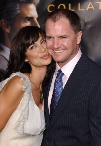 Adam Beason and his wife, Catherine Bell arrived at the Premiere of Collateral at The Orpheum Theatre, Los Angeles, California on 2nd August 2004.