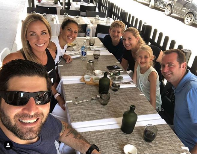 Carli Lloyd having dinner with her family in Lyon, France.