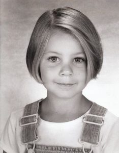 Childhood photo of Ayla Kell.