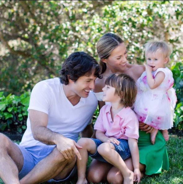 Alec Mazo and his wife, Edyta with their children