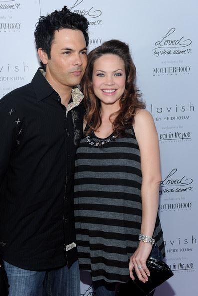 Rebecca Herbst and her husband, Michael Saucedo arrived at Heidi Klum & A Pea in the Pod's Mom's-to Be Night Out on 26th May 2010, in Beverly Hills, California.