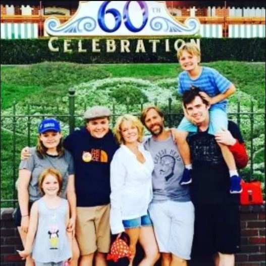 Maura West and her husband with their children.