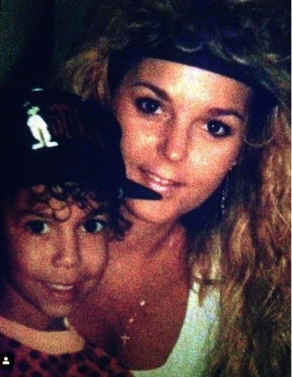 Childhood photo of Bryton James with his mother.