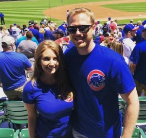 Stephanie Mead with  Chad Schulz in a game field