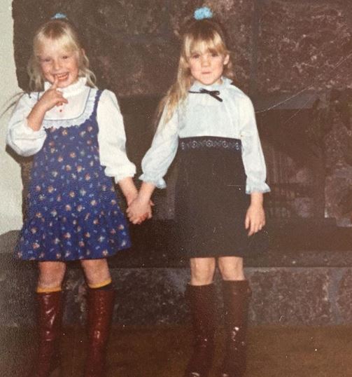 Childhood photo of Jaime Bergman with her cousin sister.