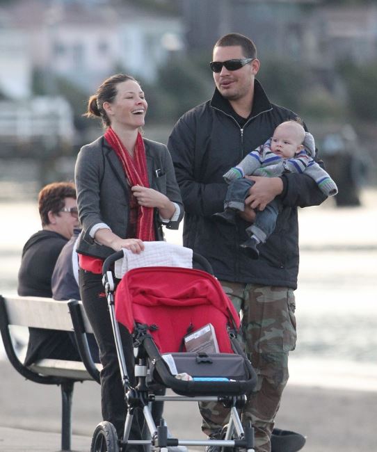 Evangeline Lilly and her love partner, Norman Kali walking with their kids.