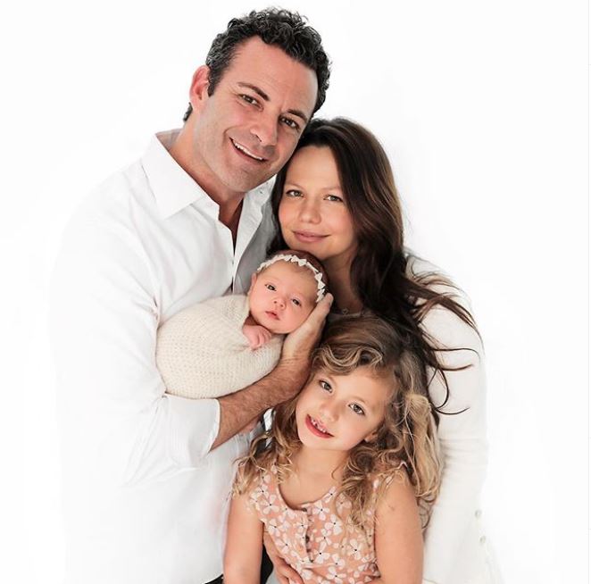 Photo of Tammin Sursok with her husband and their children.