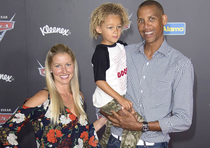 Reggie Miller with his partner and child