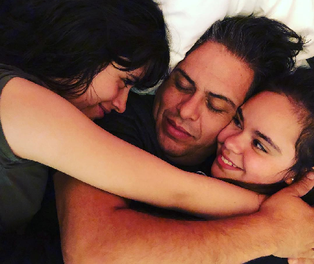 Sofia, Camila and their dad. 