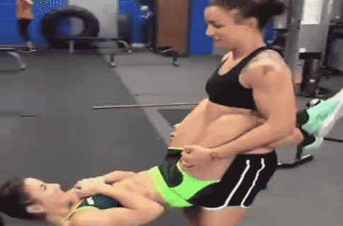 Raquel Pennington and Tecia Torres working out in gym