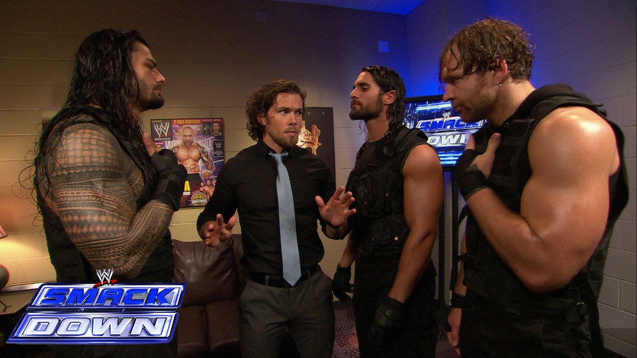 From left to right) Roman Reigns, Brad Maddox, Seth Rollins, and Dean Ambro...