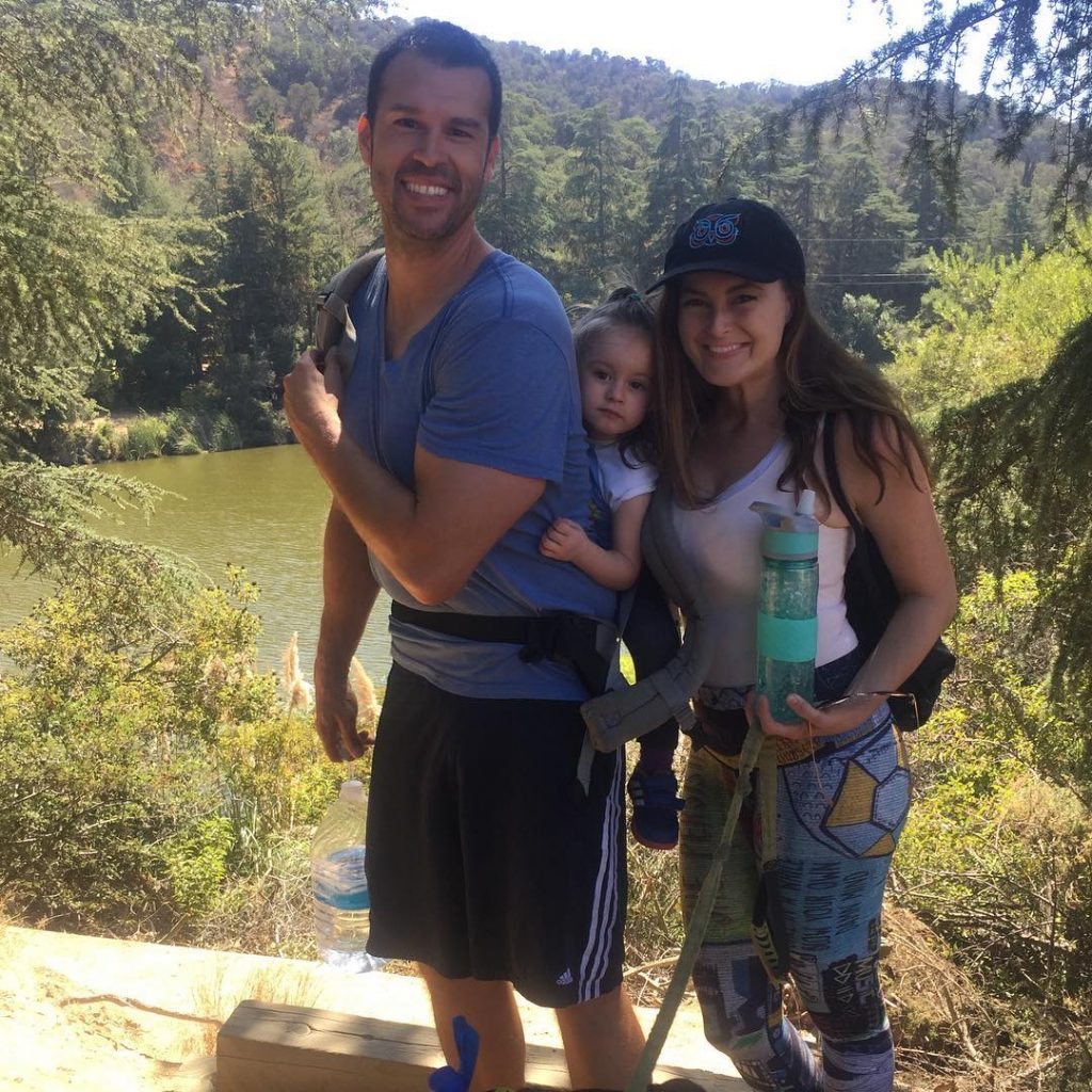 Rachel with her husband and daughter