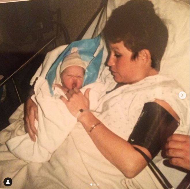 Childhood photo of newly-born baby, Jordan Lloyd with her mother.