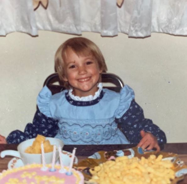 Childhood photo of Zoie Palmer in her 5th birthday party.