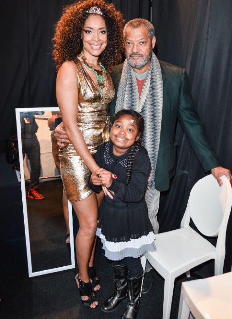 Delilah Fishburne with her parents at Spring George Pimentel in 2015.