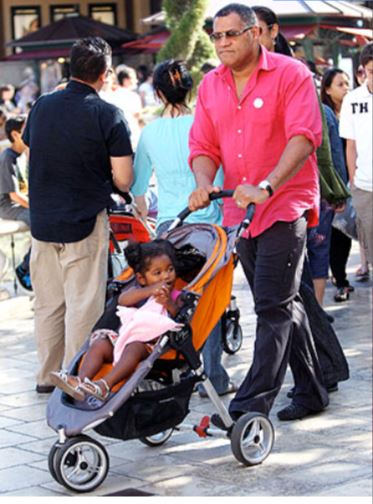 Childhood photo of Delilah Fishburne while going out with her father, Laurence Fishburne.