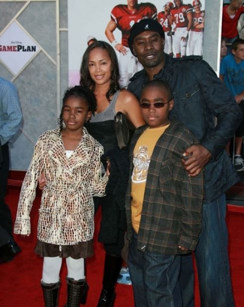 Childhood photo of Grant Chestnut with his parents and sister.